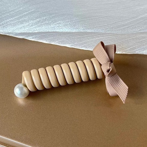 Close-up of elegant twist hair clip for thick hair