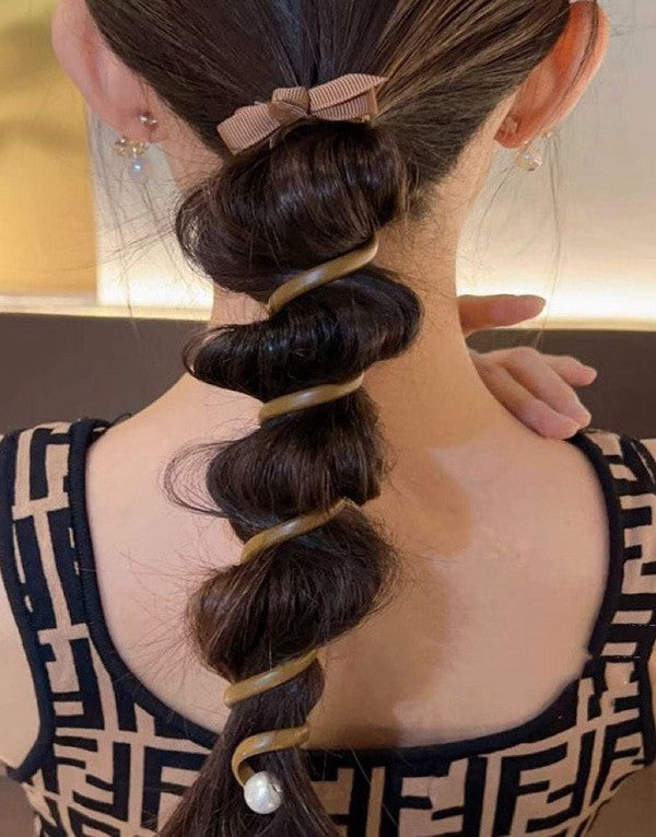 Twist hair clip on brunette model