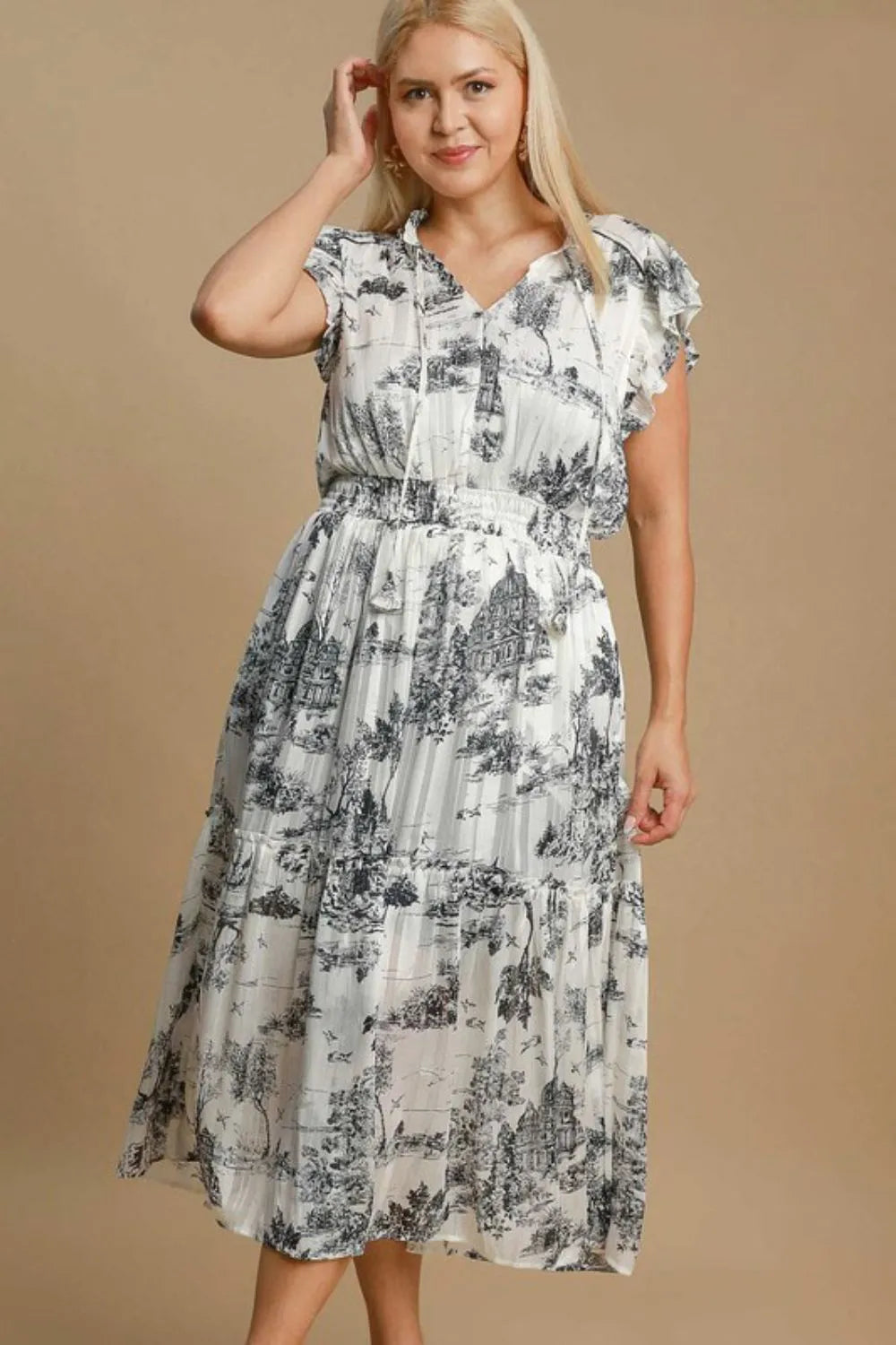 Smocked and ruffled plus size midi dress in artistic print
