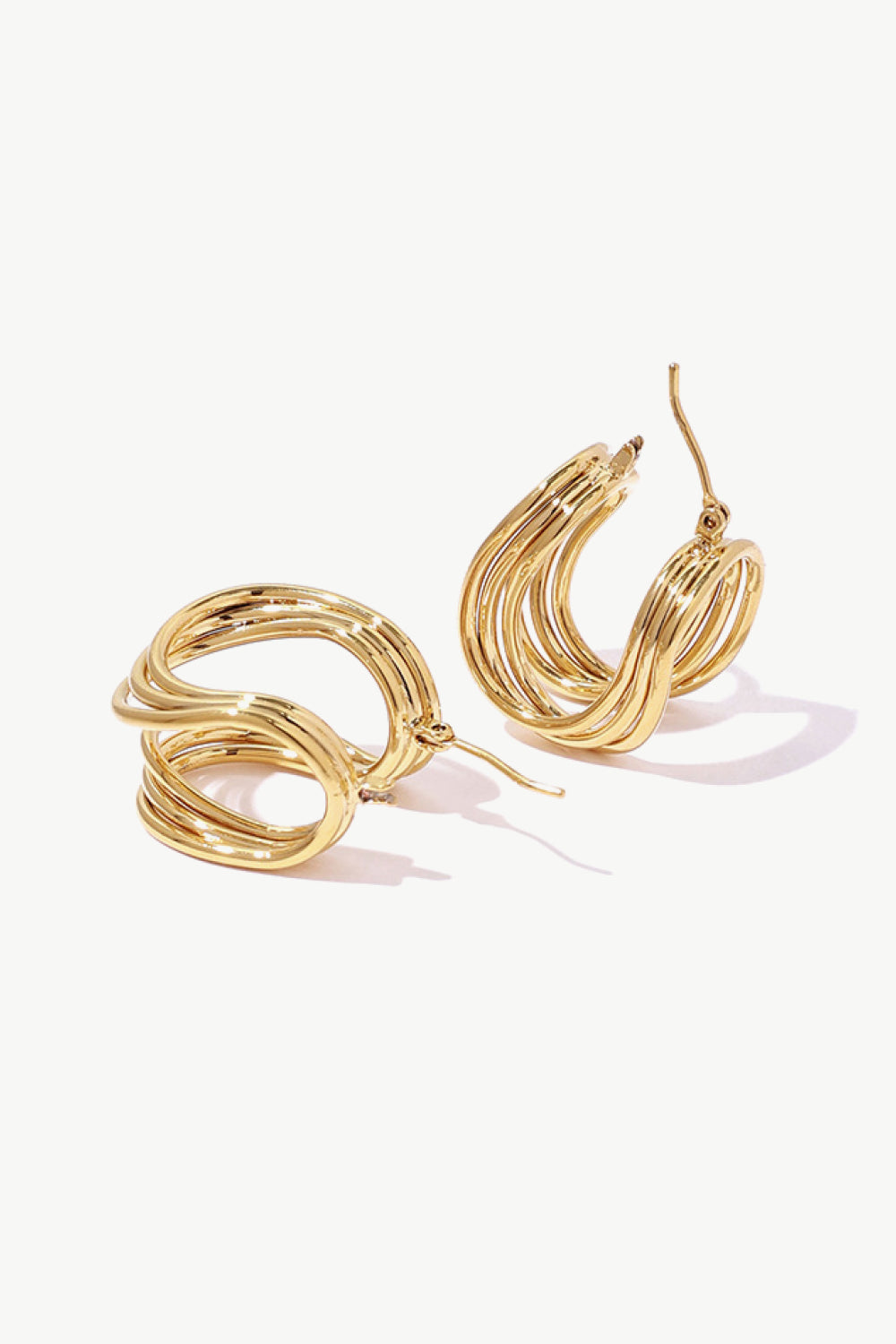 U-shaped hoop earrings on model